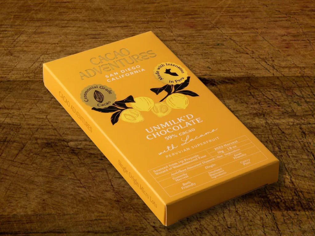 Cacao Adventures Unmilk'd 53% dairy-free chocolate bar with lucuma on a rustic wooden surface, single-origin Peru