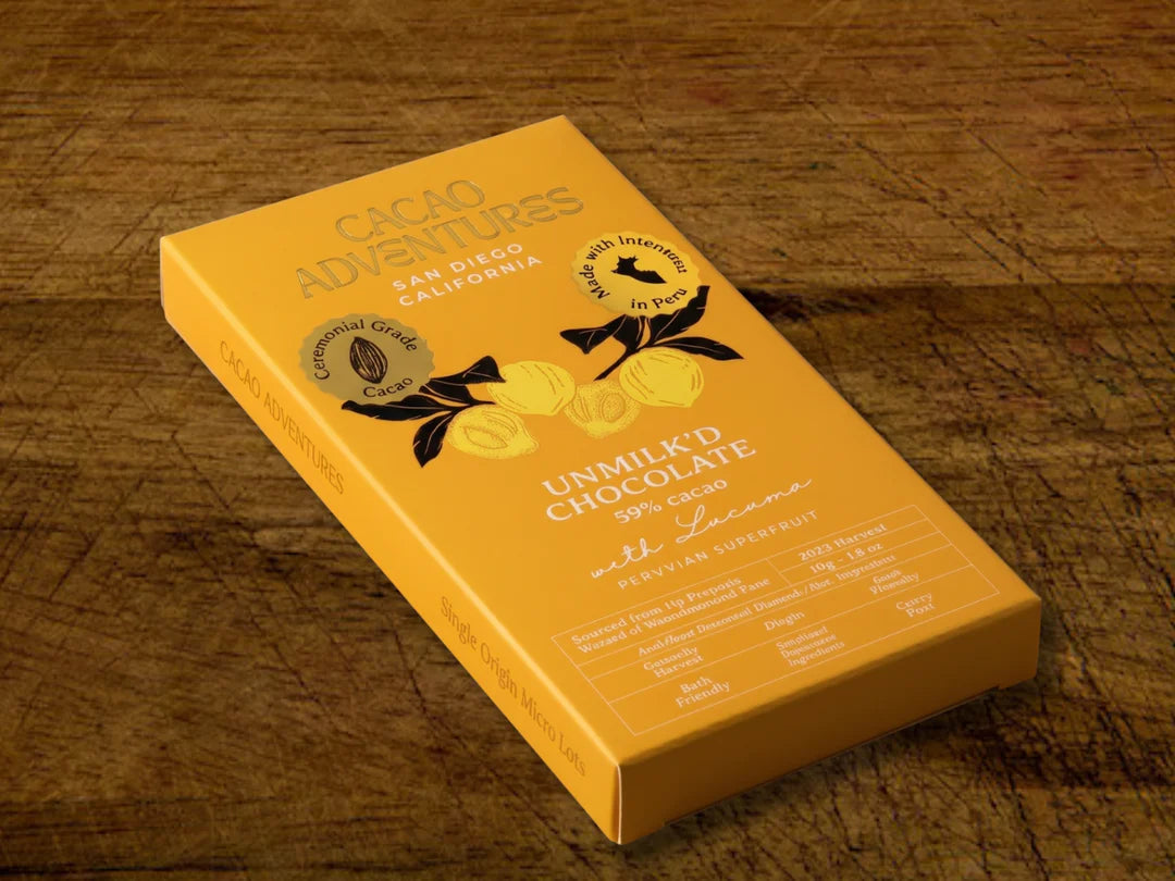 Cacao Adventures Unmilk'd 53% dairy-free chocolate bar with lucuma on a rustic wooden surface, single-origin Peru