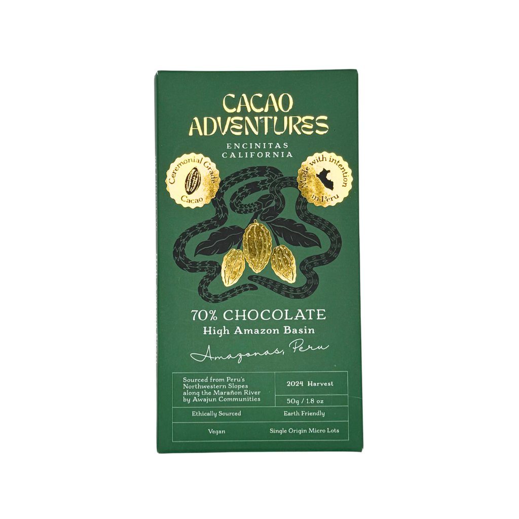 A 70% chocolate bar package from Cacao Adventures, featuring a dark green box with gold foil details, including the brand name, cocoa bean illustrations, and product information, set against a plain white background.