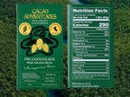 Front and back of a Cacao Adventures chocolate bar package shown side by side against a forest background. The left panel shows the dark green wrapper with yellow and white text and cocoa bean illustrations; the right panel shows the Nutrition Facts label.