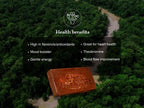 An aerial view of a dense green forest with a winding river, overlaid with text reading 'Health benefits' and bullet points about flavonols/antioxidants, heart health, mood, theobromine, and blood flow improvement. A large ceremonial cacao bar labeled 'Cacao Adventures' is shown in the lower middle.