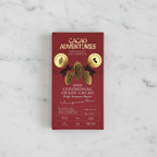 Cacao Adventures 100% Ceremonial Grade Cacao Bar red box on white marble surface, single-origin High Amazon Peru, vegan sugar-free keto-friendly, 50g