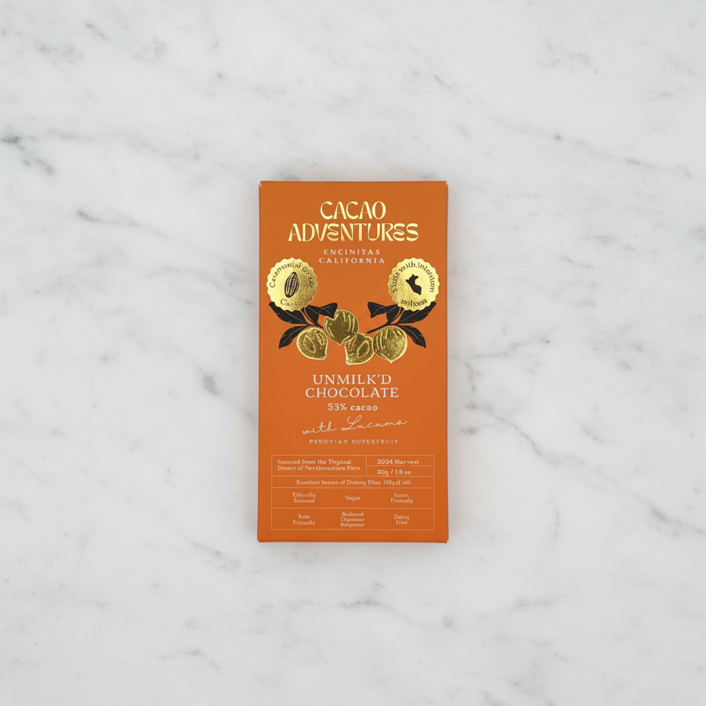 Cacao Adventures Unmilk'd Chocolate 53% cacao bar with Lucuma on white marble surface, dairy-free vegan keto-friendly, single-origin Peru