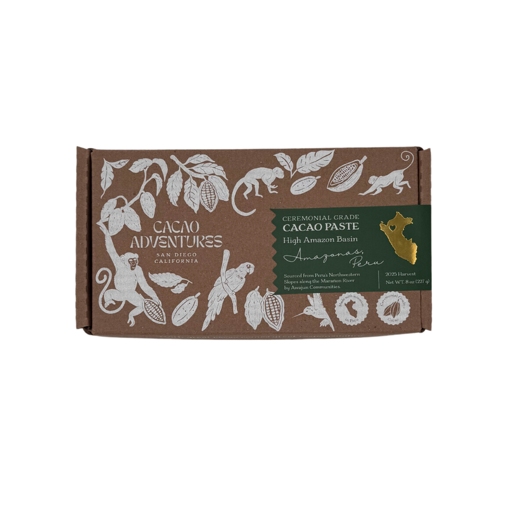 Cacao Adventures 70% Dark Chocolate Bar dark green box on white marble surface, single-origin High Amazon Peru, vegan two-ingredient, 50g