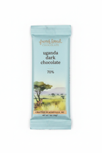 French Broad Chocolate 70% Uganda Dark Chocolate light blue packaging front on white background, single-origin Uganda, vegan dairy-free