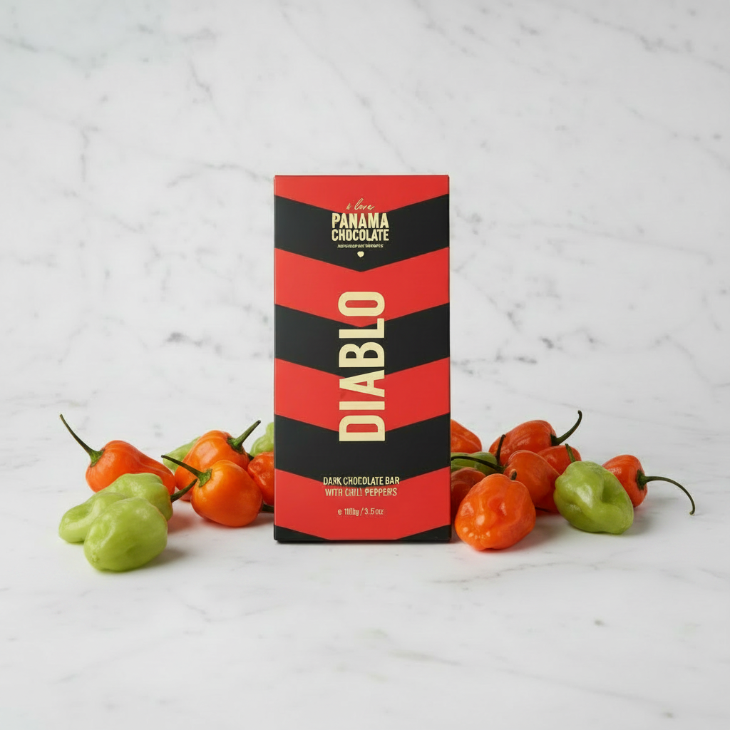 I Love Panama Chocolate Diablo 70% dark chocolate bar with Ají Chombo Panamanian chili peppers, front view, on a white marble background