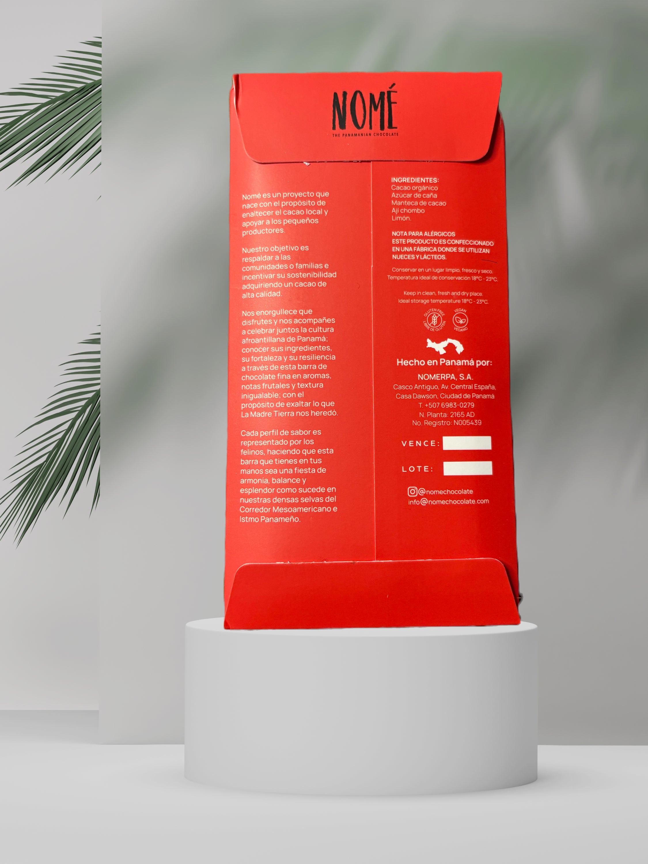 Back label of Nomé 70% Dark Chocolate Aji Chombo Limón bar with ingredients and tasting notes, single-origin Panama, vegan dairy-free