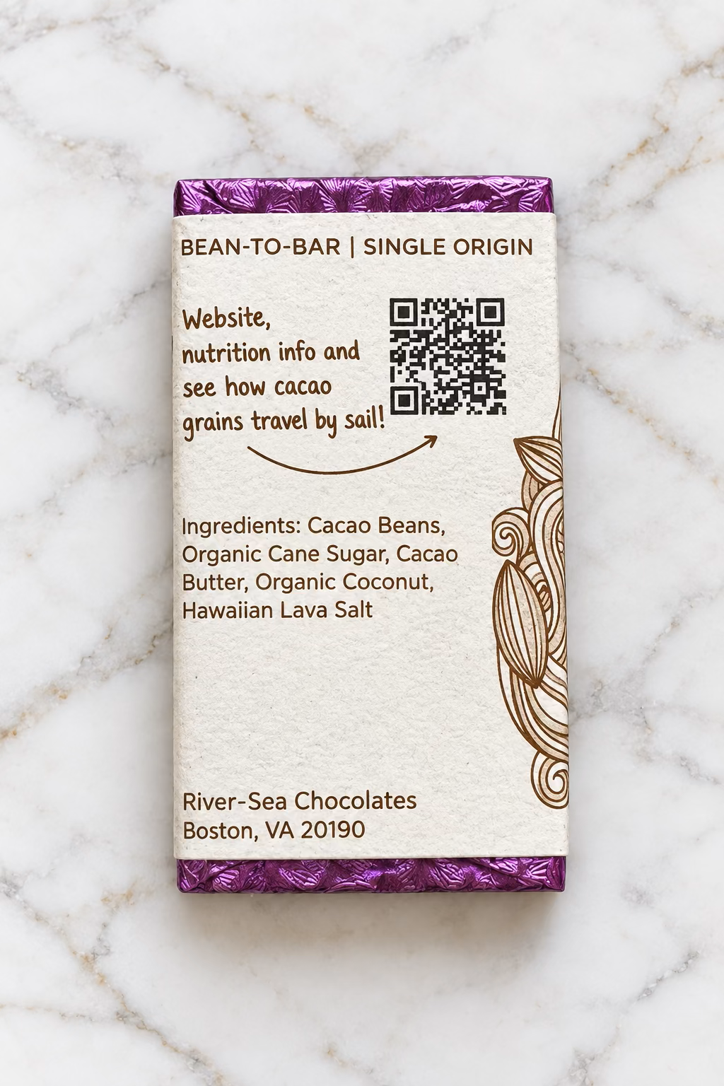 The 80% Surfer's Dark Seas back of packaging from River Sea Chocolates, showing the ingredients and a QR code, on a white marble background.