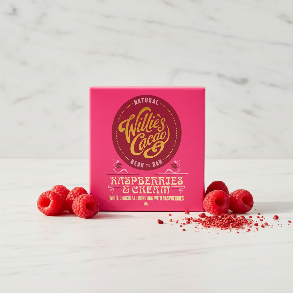Willie's Cacao Raspberries and Cream 36% White Chocolate hot pink box on white marble with fresh raspberries, white chocolate bursting with raspberries, natural bean-to-bar, 50g