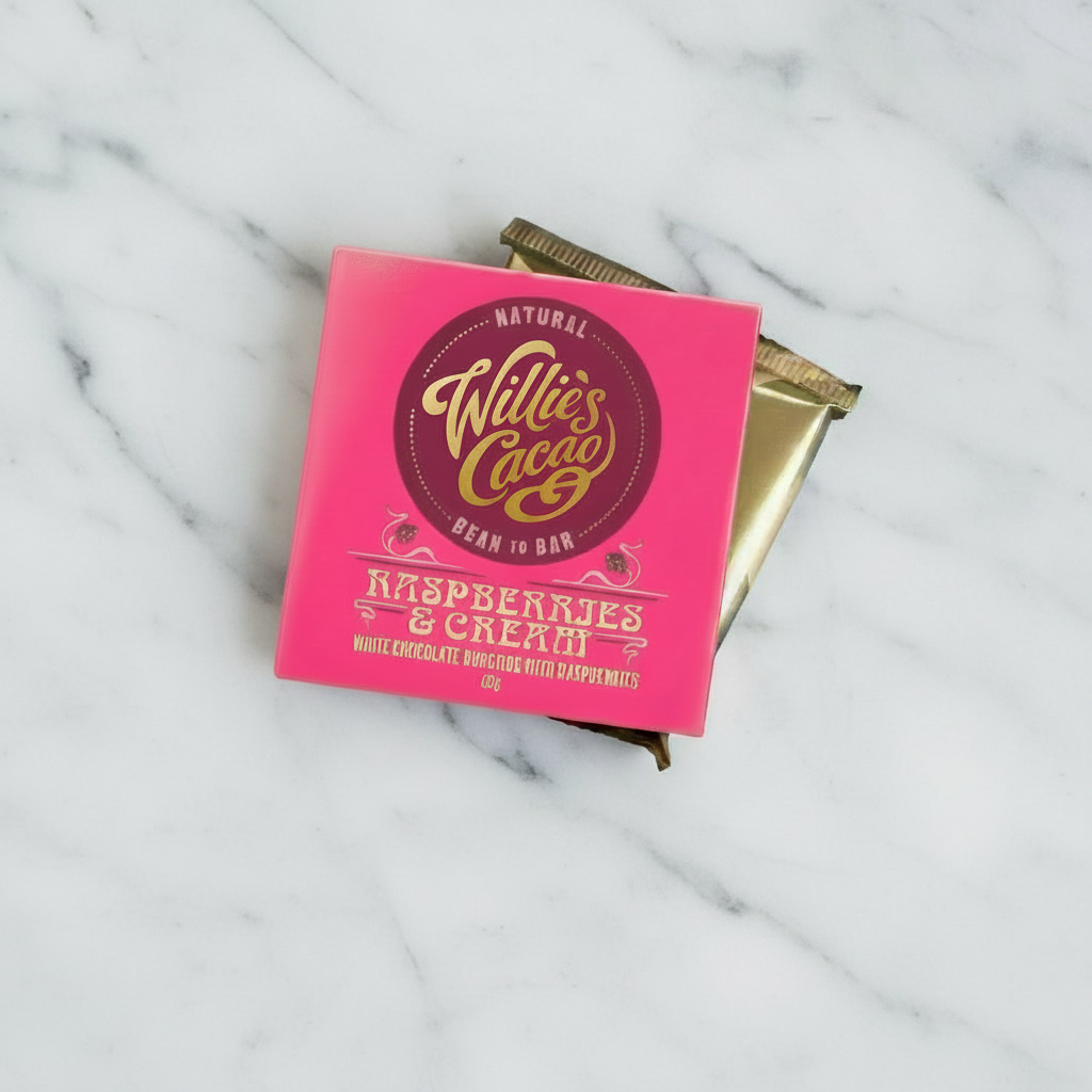Willie's Cacao raspberry and cream chocolate packaging on a marble background