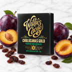 Chulucanas 70% dark chocolate bar on white marble with raisins and plums