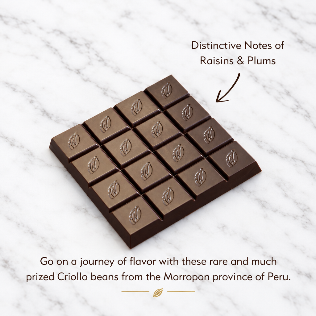 Chulucanas unwrapped chocolate bar on white marble background