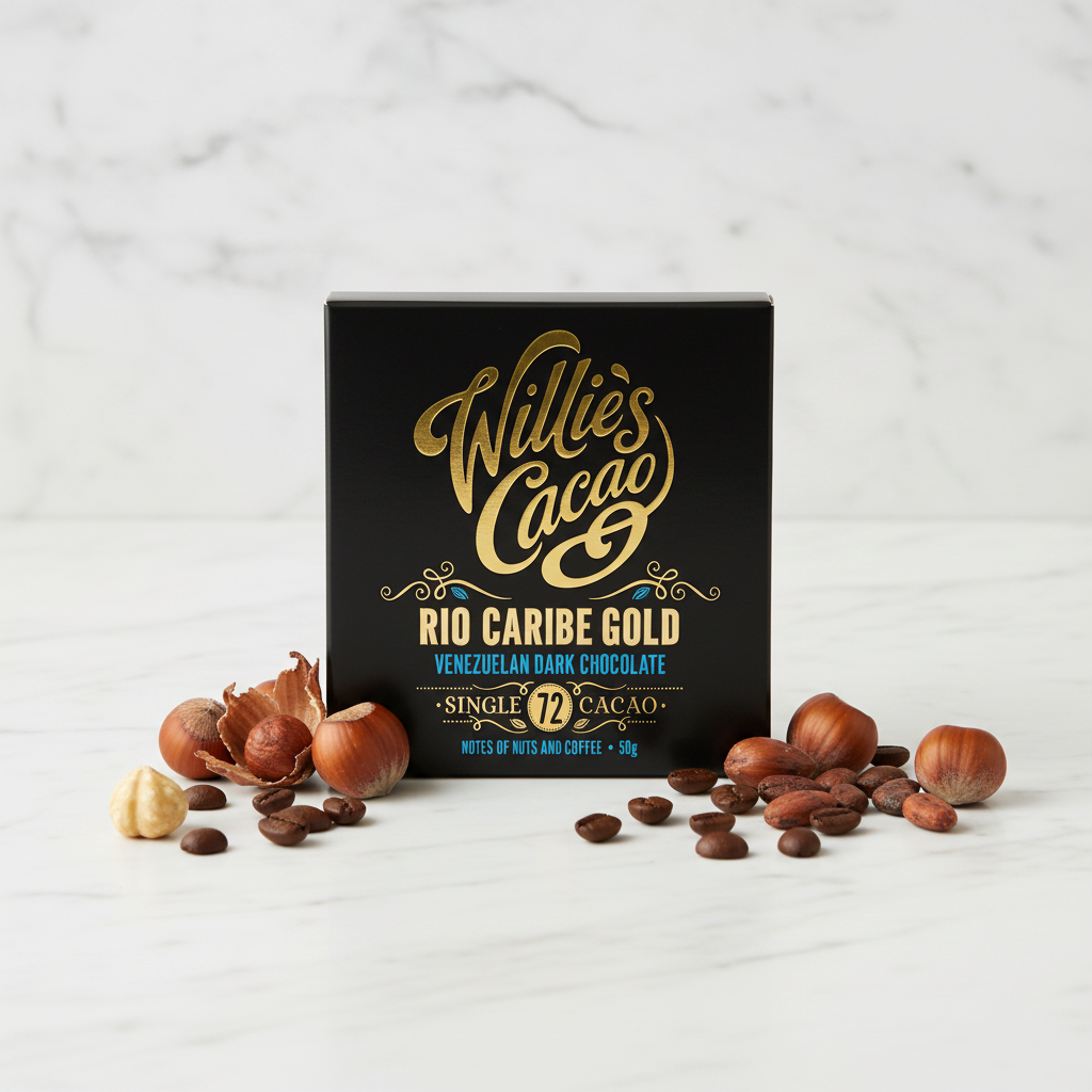 Willie's Cacao Rio Caribe Gold 72% Venezuelan Dark Chocolate black box on white marble with roasted hazelnuts and coffee beans, single-origin Rio Caribe Venezuela, vegan soya-free gluten-free, 50g