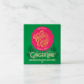 Willie's Cacao Ginger Lime 70% Dark Chocolate green box on white marble surface, crystallised ginger and essential lime oil, vegan soya-free gluten-free, 50g