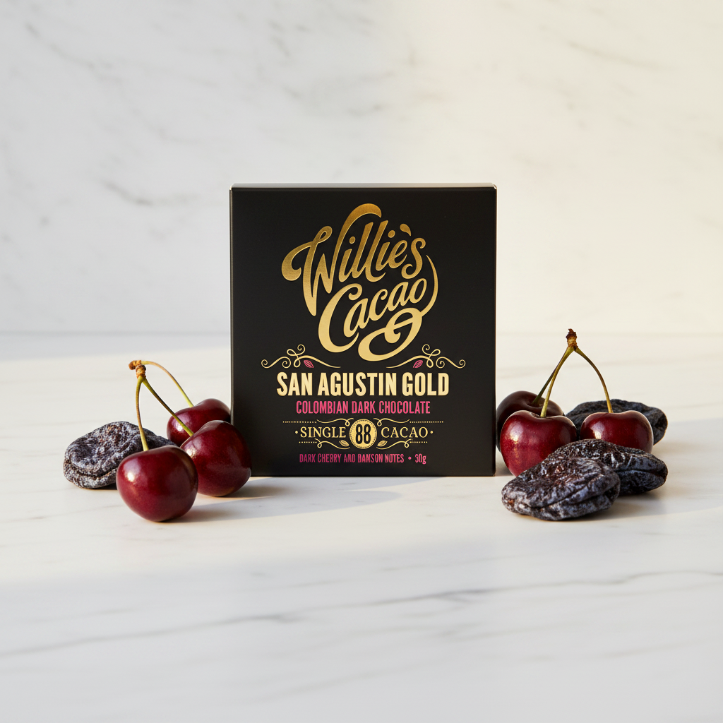 Willie's Cacao San Agustín Gold 88% Colombian Dark Chocolate black box on white marble with dark cherries and damsons, single-origin San Agustín Colombia, vegan soya-free gluten-free, 50g